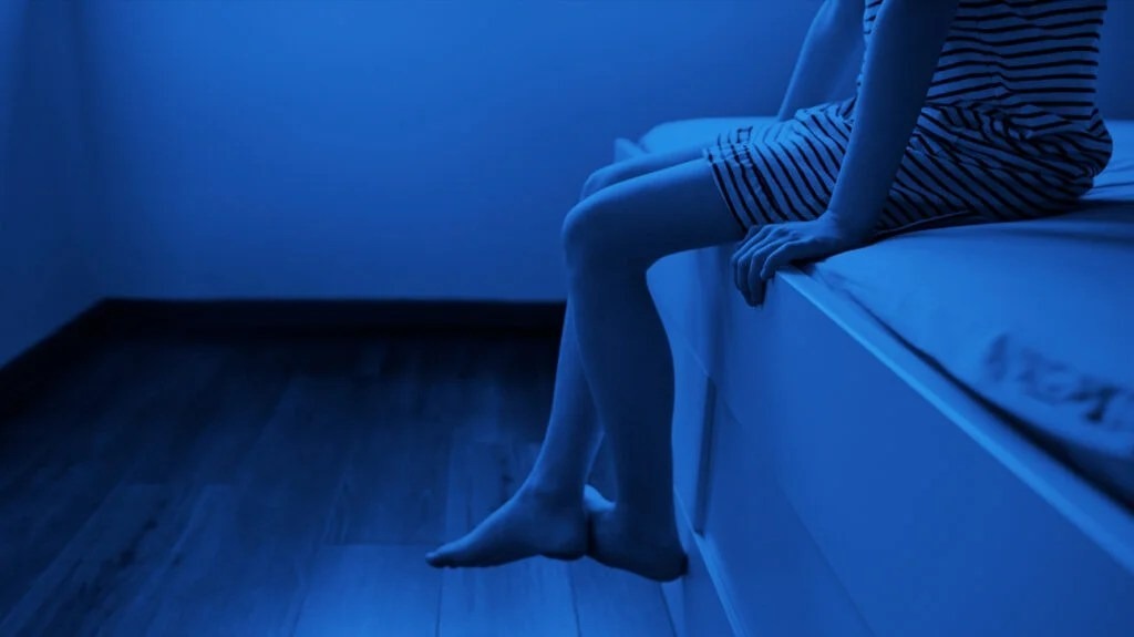 sitting_at_the_edge_of_the_bed-1-3